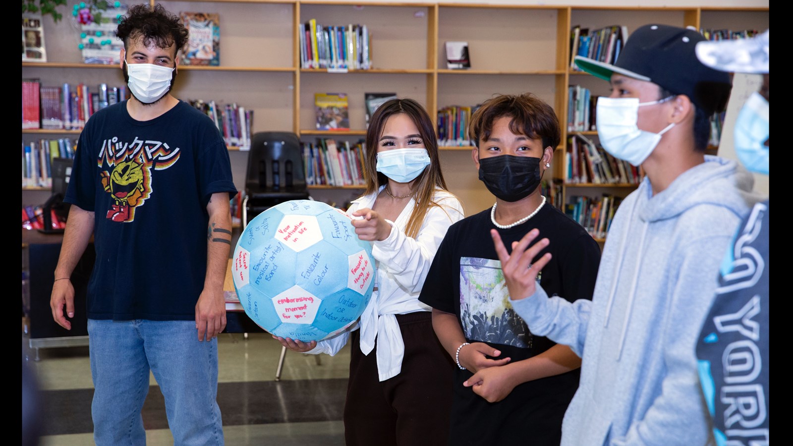 In this activity, leadership students pick conversation topics from a ball they pass around, and then task others with speaking on the topic.